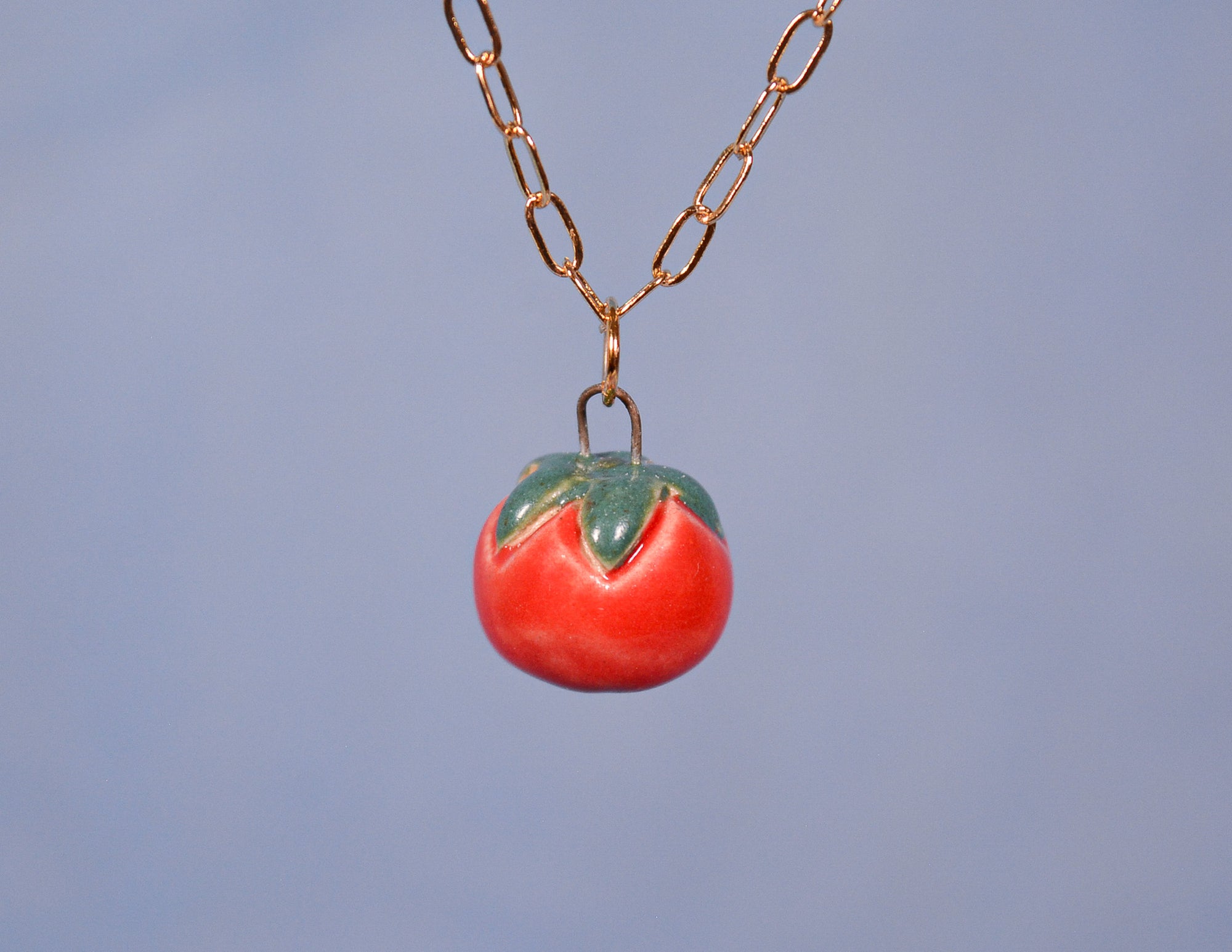 Hand-sculpted ceramic tomato necklace pendant on gold chain - Juice Ceramics handmade jewelry